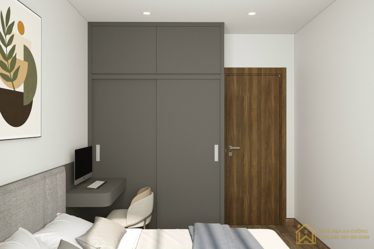 Phòng ngủ 2 – tủ cánh trượt xám graphite kết hợp bàn học liền tường căn hộ Ecopark Aqua Bay